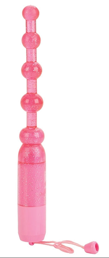 Pink vibrating beads, out of packaging to show what it looks like.