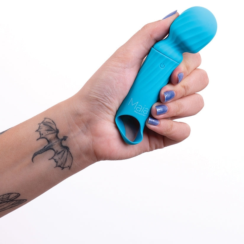 Hand holding a blue tool with 'Mala' branding on a white background