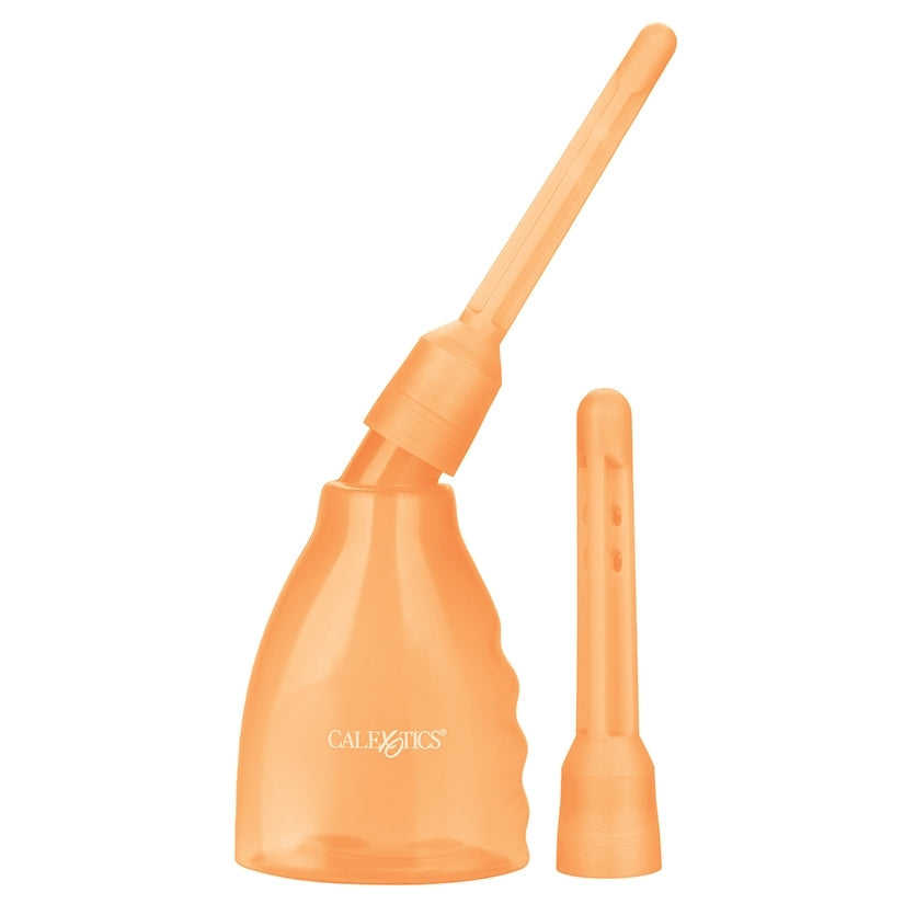 Orange enema bag with nozzle on a white background